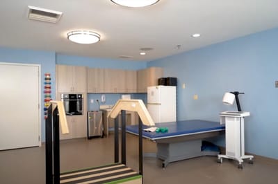 Interior therapy space with equipment and furniture