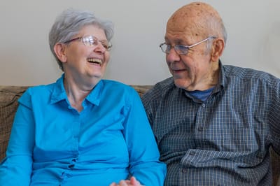 Two residents enjoying a candid moment together.