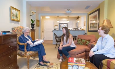 Residents enjoying time together in a common area.