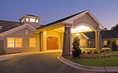 Front entrance of the facility at twilight