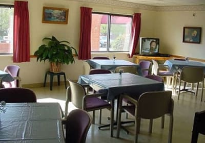 Dining area with tables and plants