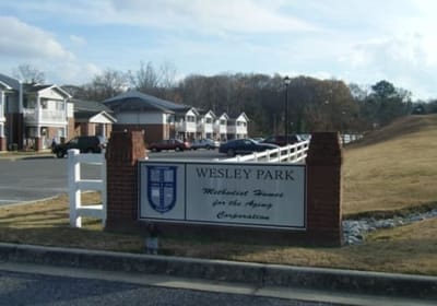 Exterior sign for Wesley Park facility