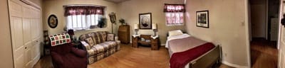 Cozy resident room with a couch and bed