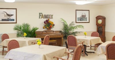 Bright common area with tables and decorations