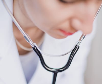 Close-up of a healthcare professional with a stethoscope