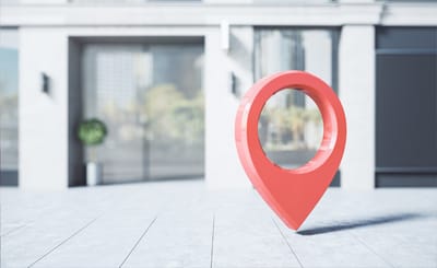 Red location marker in a modern setting