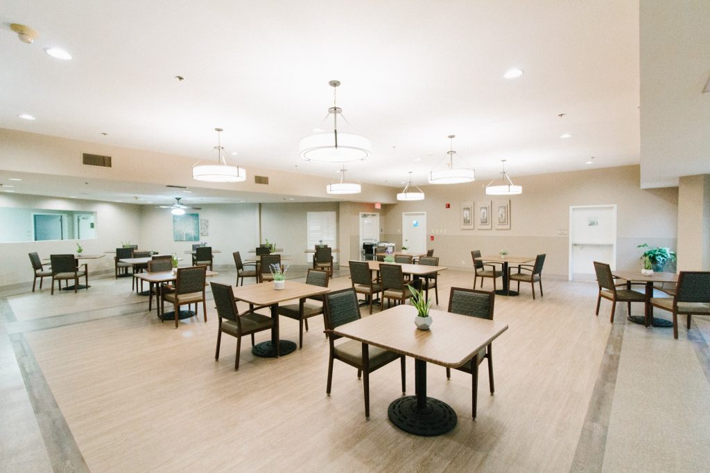 Spacious dining room with tables and chairs