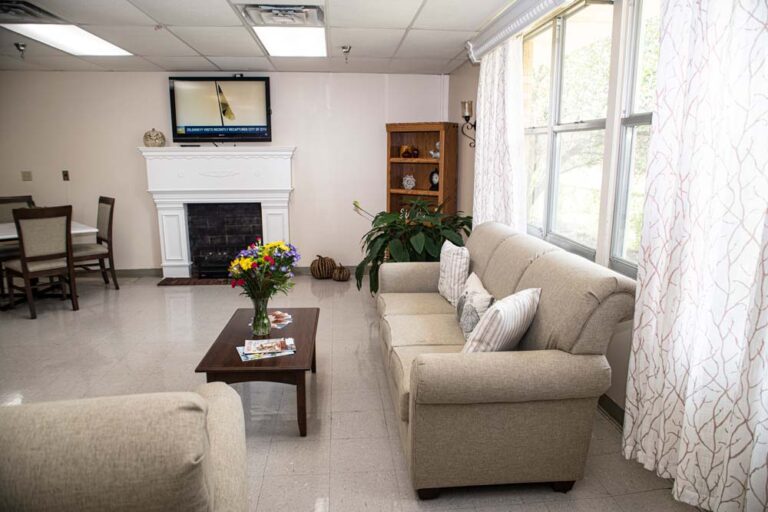 Cozy common area with comfortable seating and decorative plants