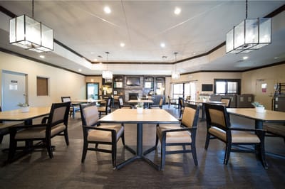 Bright dining area with ample seating and decor