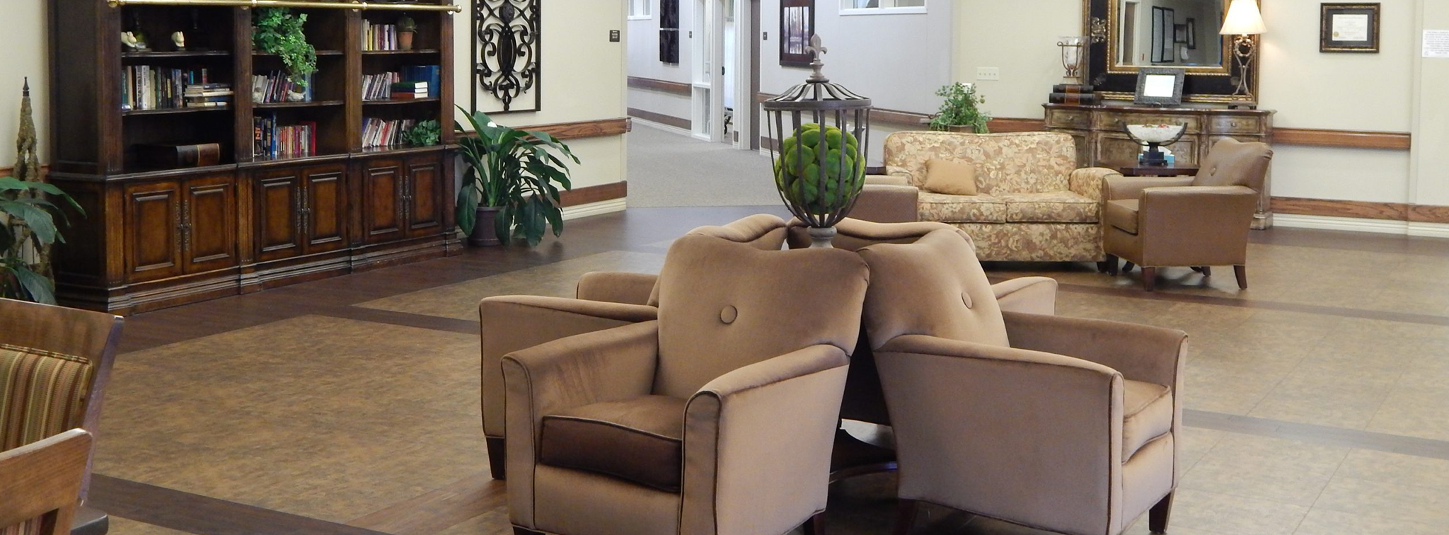 Interior common area with seating and bookshelves