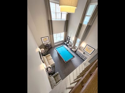 Common area with a pool table and seating