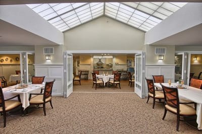 Dining area with tables set for meals