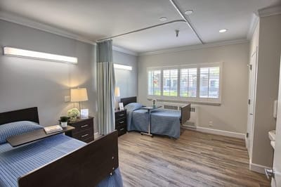Comfortable shared bedroom in a senior living facility