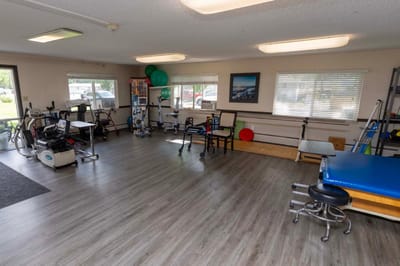 Physical therapy area with equipment and exercise space