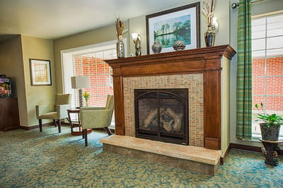 Cozy common area with a fireplace and seating