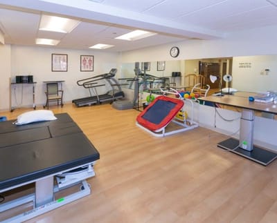Interior view of a therapy room with equipment