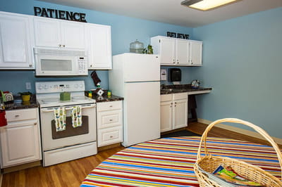 A bright kitchen area with colorful decor