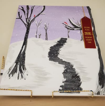Progressive Care Center, Nursing Home in Shreveport, LA — Snowy landscape painting with a red ribbon