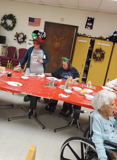 Residents enjoying a festive meal in the common area