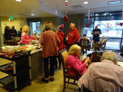 Residents and staff enjoying a festive gathering