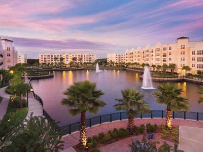 Scenic view of a senior living facility by a lake