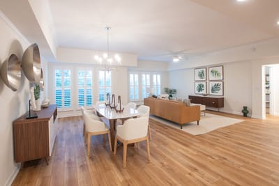 Spacious common area with dining table and comfortable seating