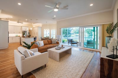 Bright living room with modern furnishings and outdoor view