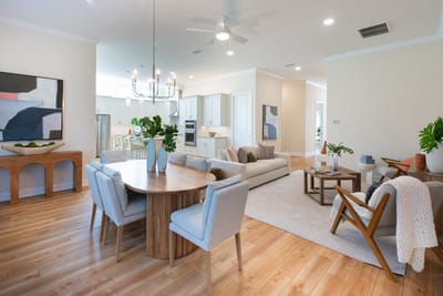 Bright interior common area with dining and seating