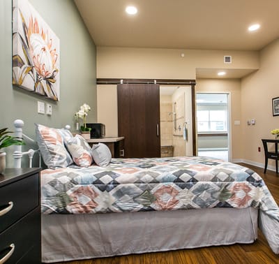 Brightly lit resident bedroom with modern decor
