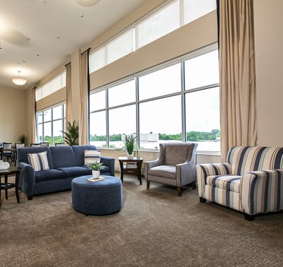 Bright communal lounge area with comfortable seating