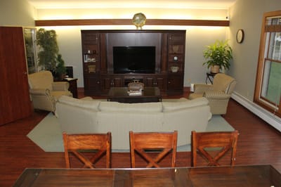 Interior common area with seating and television