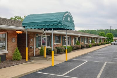Front entrance of a senior living facility with canopy