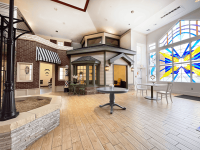 Bright common area with large stained glass windows