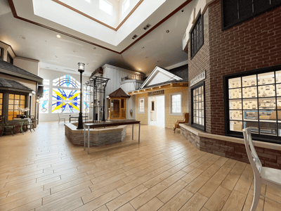Bright interior common area with decor and large window