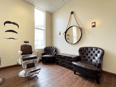 Barbershop interior with vintage chairs and mirrors