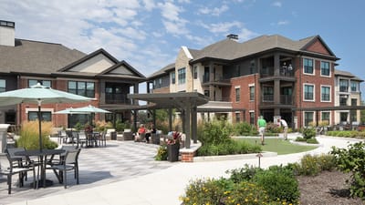 Outdoor space with seating and nearby residents