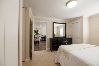 Bright interior of a resident room with furniture