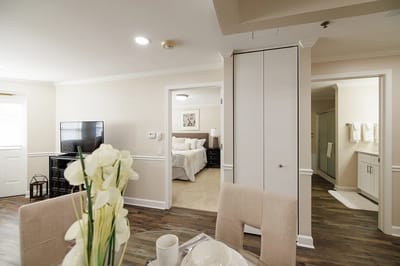 Interior view of a private resident room with furnishings