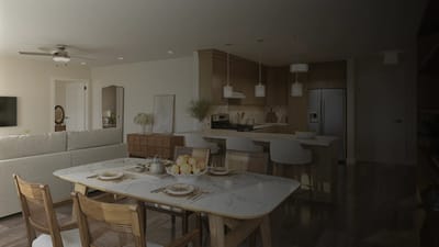Well-furnished kitchen and dining area in a modern assisted living space