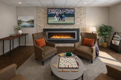 Cozy common area with seating and a fireplace