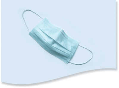 A single blue surgical mask on a white background