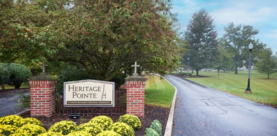 Entrance sign and pathway of Heritage Pointe