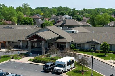 Aerial view of a senior living facility with outdoor space