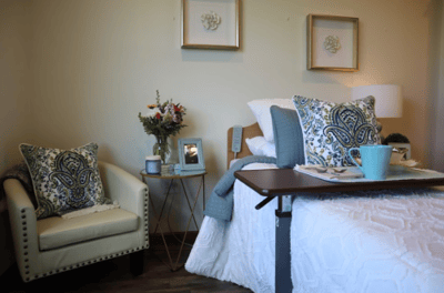 Cozy private resident room with decorative pillows