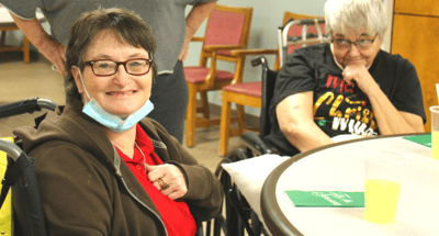 Residents enjoying time together in an activity room