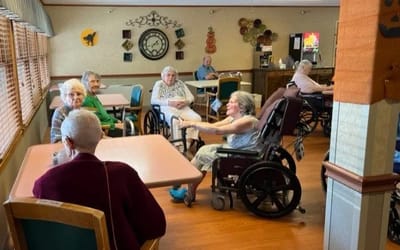 Residents engaging in conversation in a common area