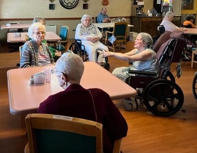 Residents engaging in conversation in a common area