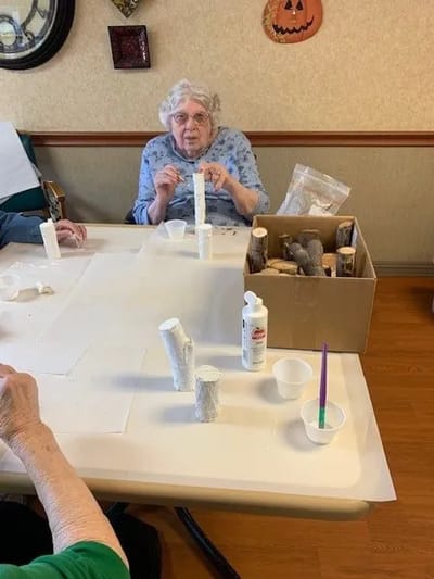 Residents engaging in an arts and crafts activity