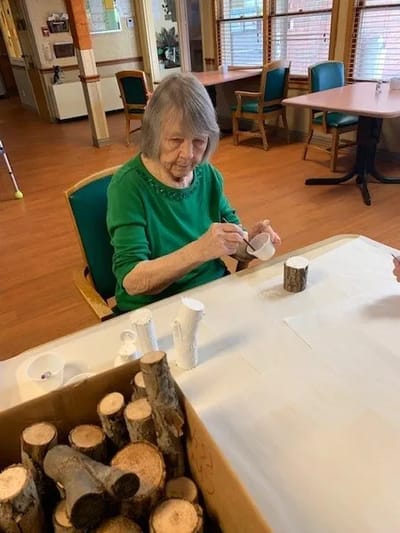 Resident engaging in an arts and crafts activity
