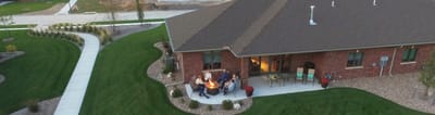 Residents enjoying an outdoor fire pit gathering
